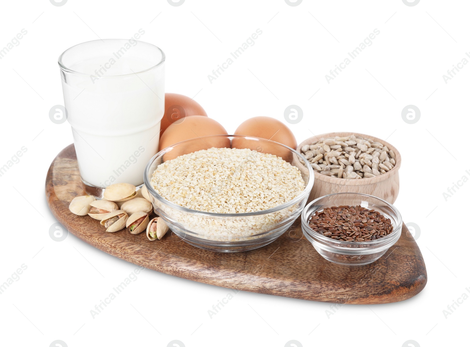 Photo of Board with different seeds, nuts and products high in healthy fats isolated on white