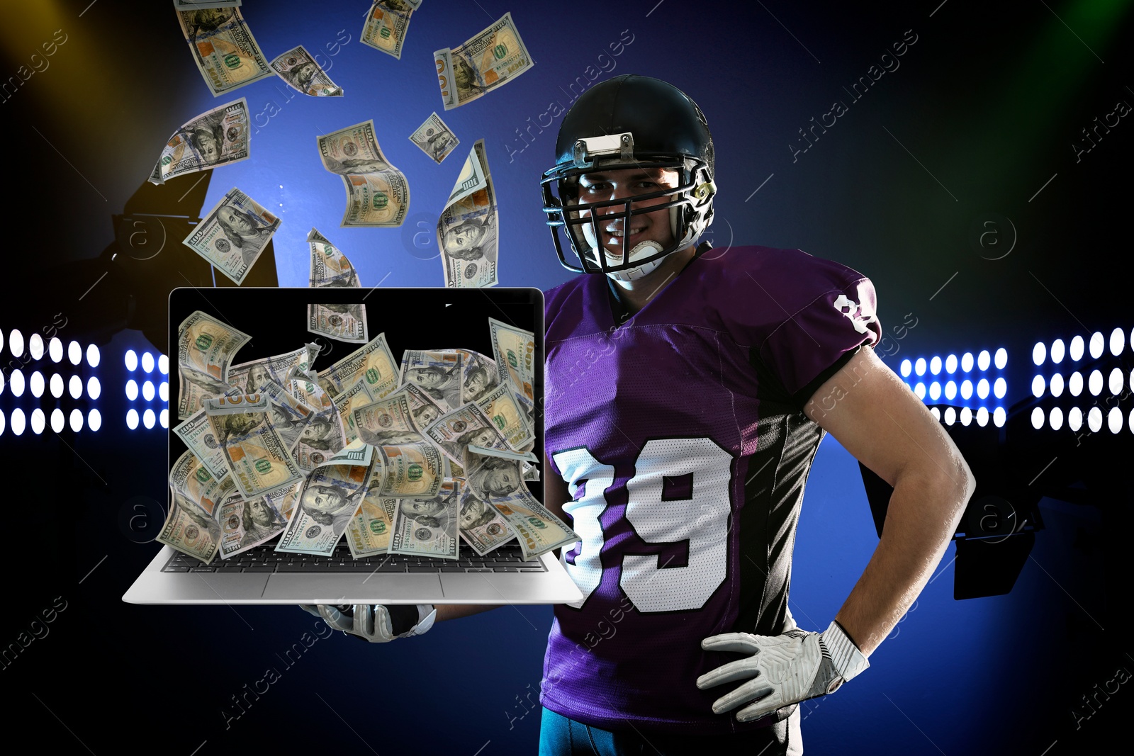 Image of Sports betting. American football player holding laptop under stadium lights. Banknotes falling into device