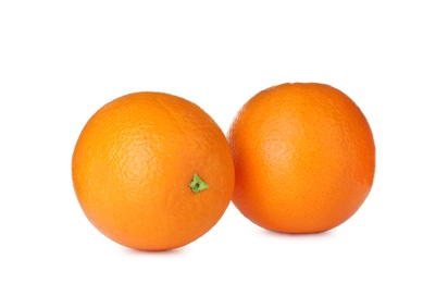 Photo of Fresh ripe oranges isolated on white. Citrus fruit