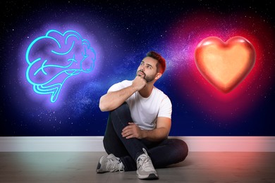 Image of Thoughtful man choosing between logic and emotions on floor. Illustrations of glowing heart and brain on starry sky