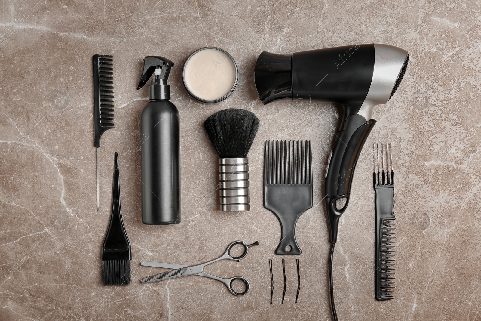 Photo of Flat lay composition with professional hairdresser tools on color background