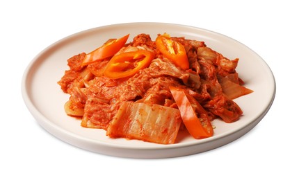 Photo of Plate of spicy cabbage kimchi with chili pepper isolated on white
