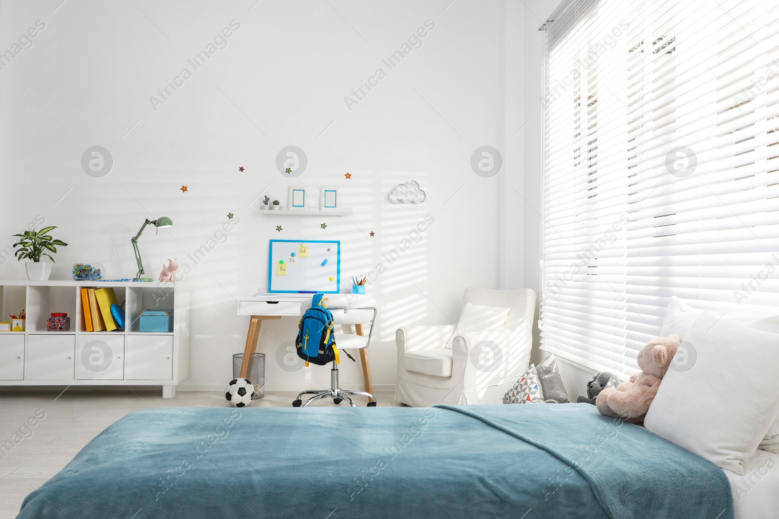 Photo of Modern child room interior with comfortable bed