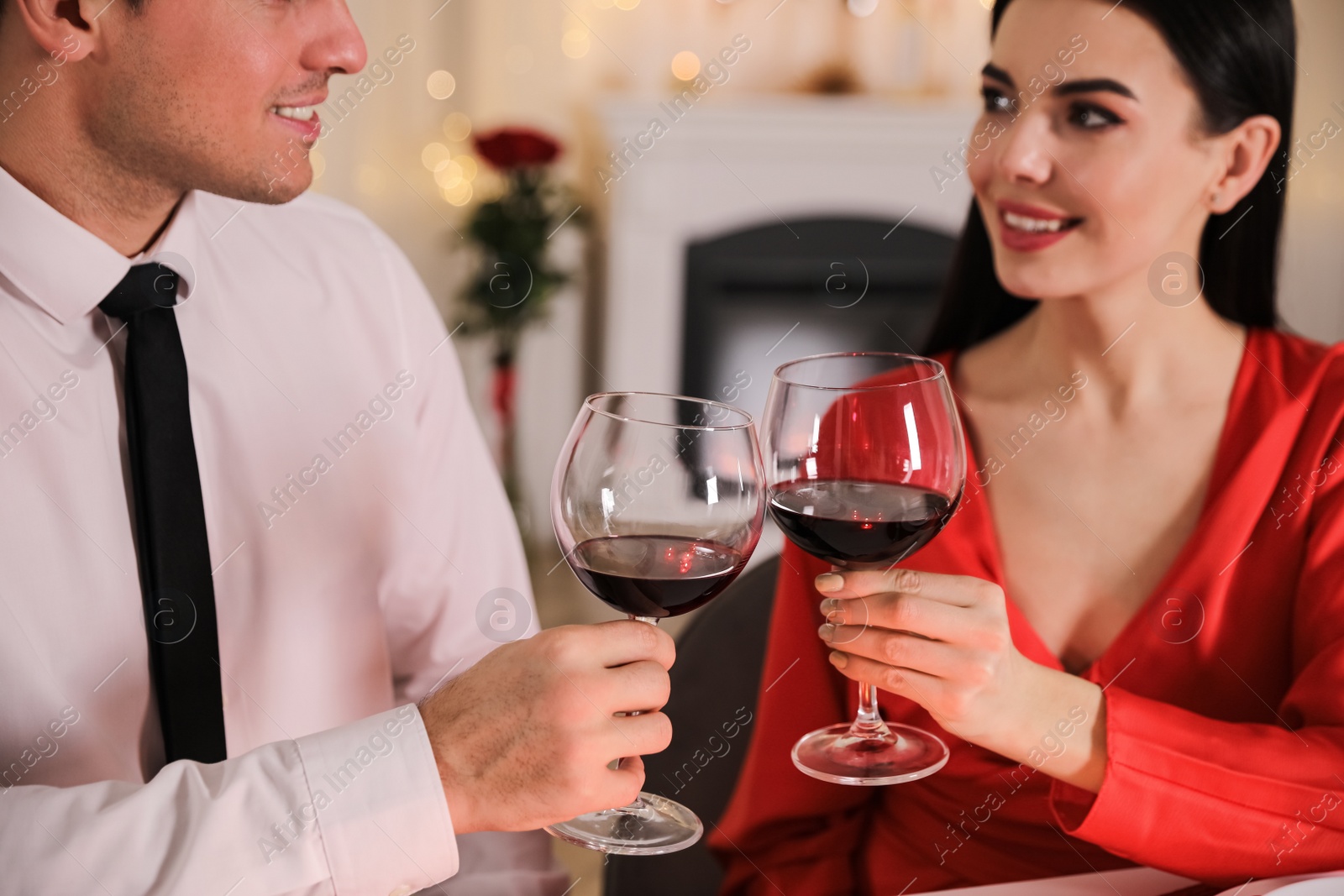 Photo of Happy couple having romantic dinner on Valentine's day in restaurant