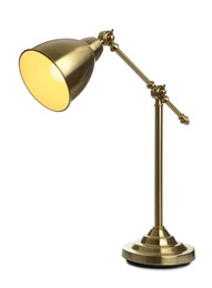 Stylish golden table lamp isolated on white