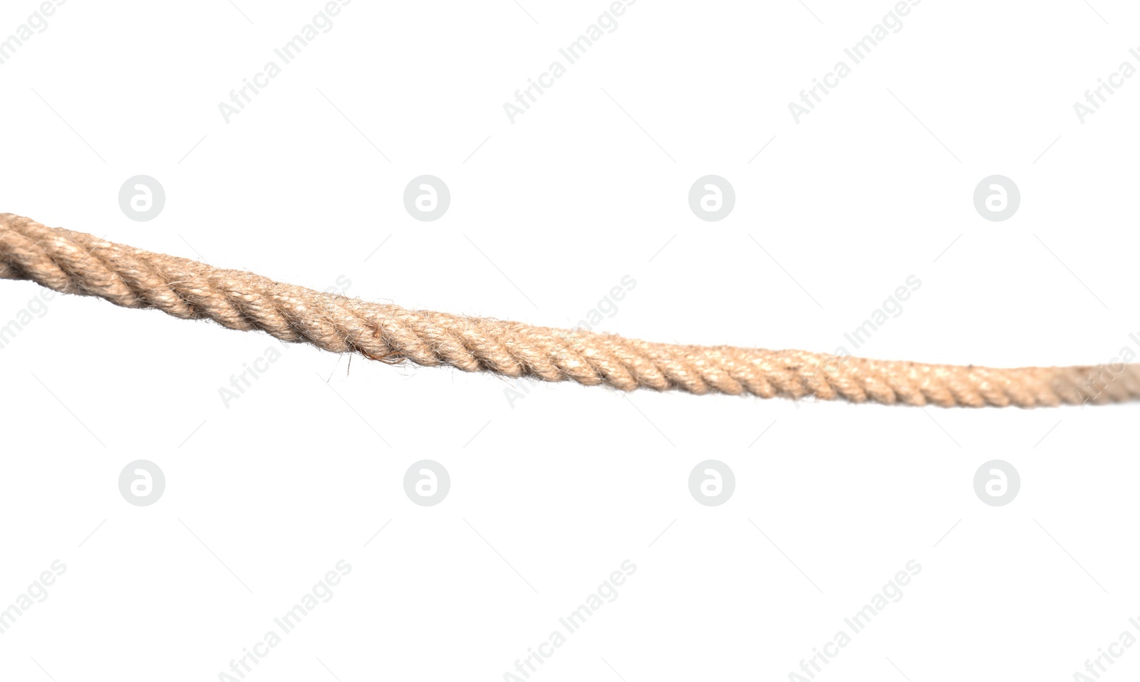 Photo of Strong nautical cotton rope on white background