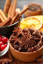 Dry anise stars in bowl, closeup. Mulled wine ingredient