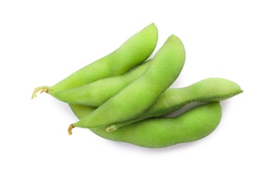 Photo of Raw green edamame pods on white background, top view