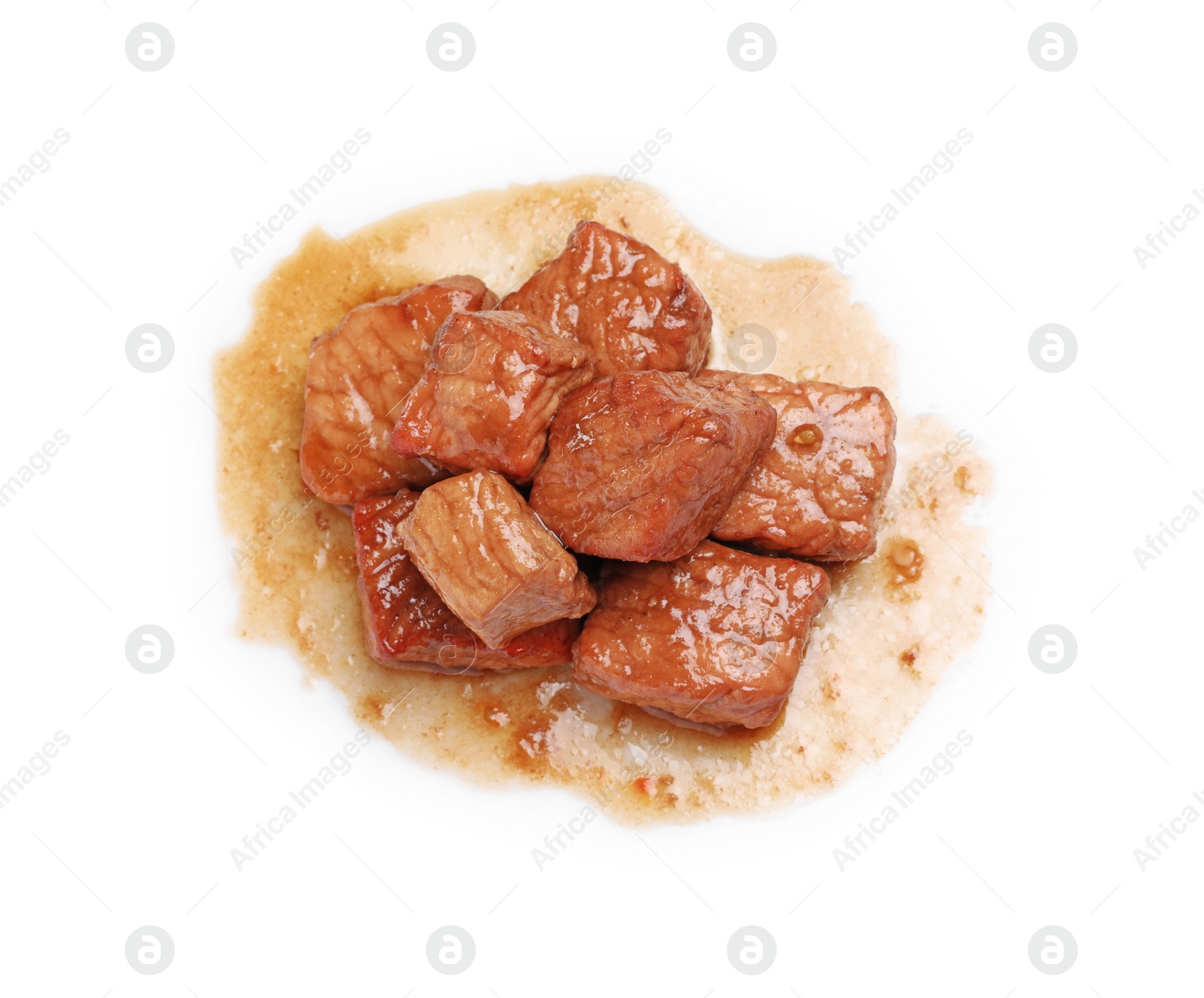 Photo of Pieces of delicious cooked beef isolated on white, top view. Tasty goulash