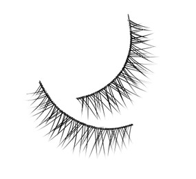 Photo of Fake eyelashes on white background, top view. Makeup product