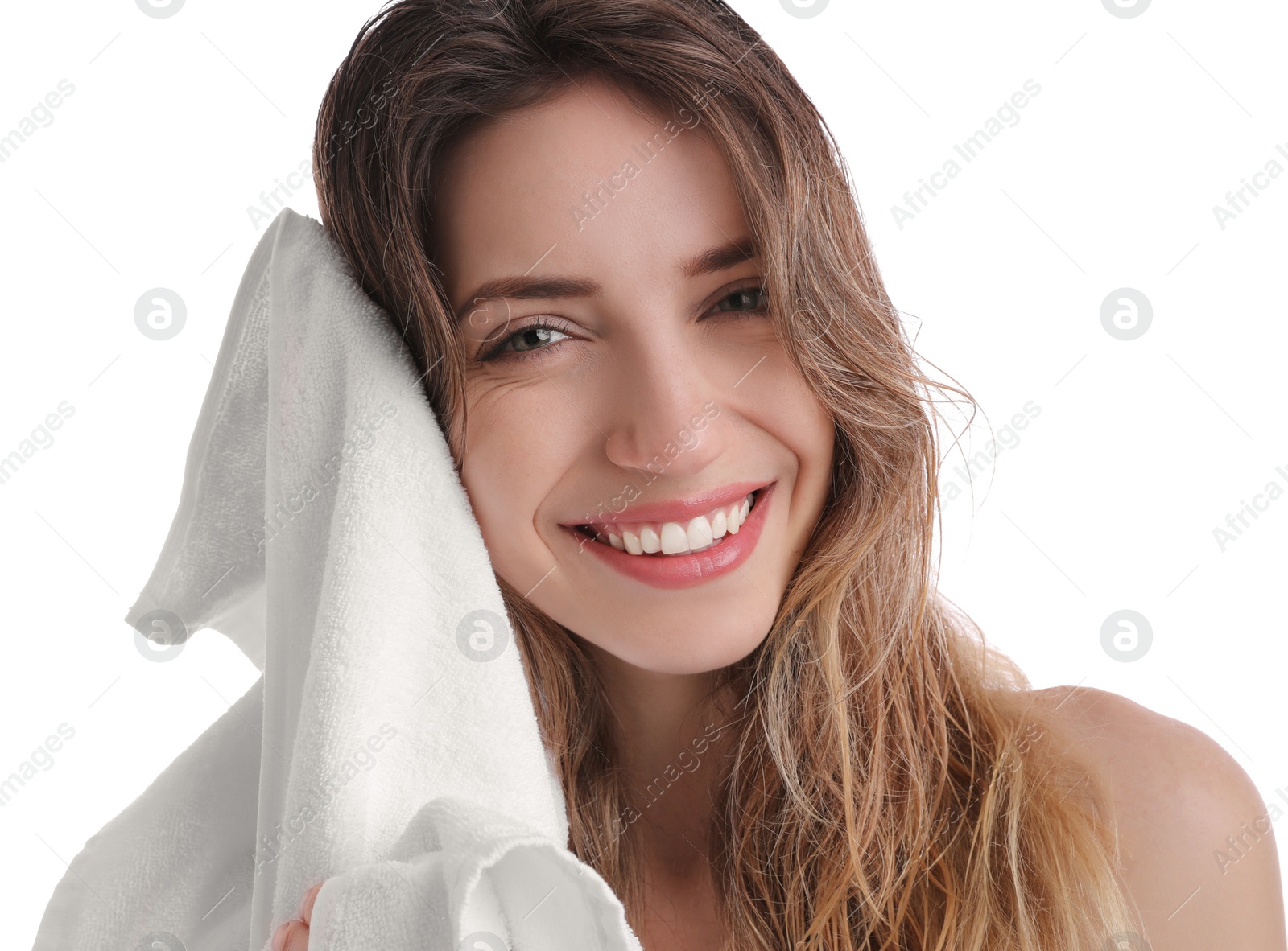 Photo of Beautiful young woman wiping hair with towel after washing on white background, closeup