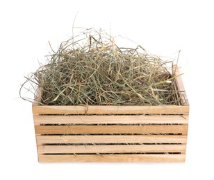 Photo of Dried hay in wooden crate isolated on white