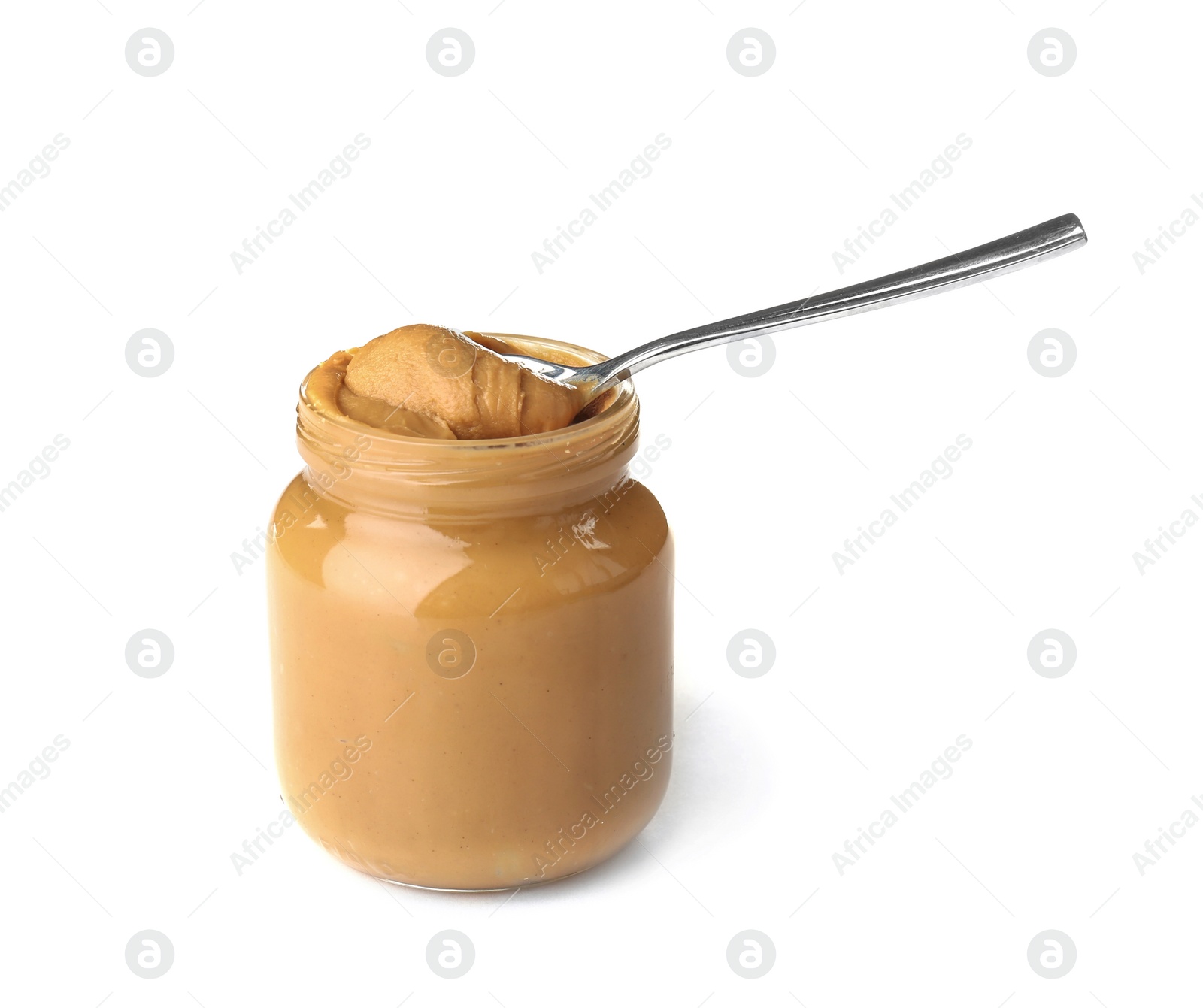 Photo of Jar and spoon with creamy peanut butter on white background