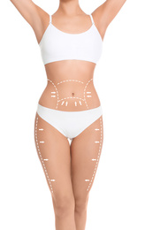 Image of Slim young woman with marks on body for cosmetic surgery operation against white background, closeup