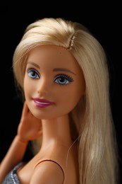 Photo of Mykolaiv, Ukraine - September 1, 2023: Beautiful Barbie doll on black background