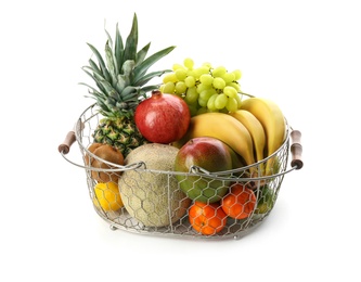 Photo of Metal basket with fresh tropical fruits on white background