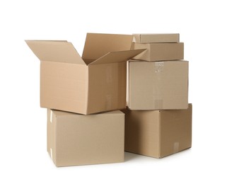 Photo of Pile of cardboard boxes on white background