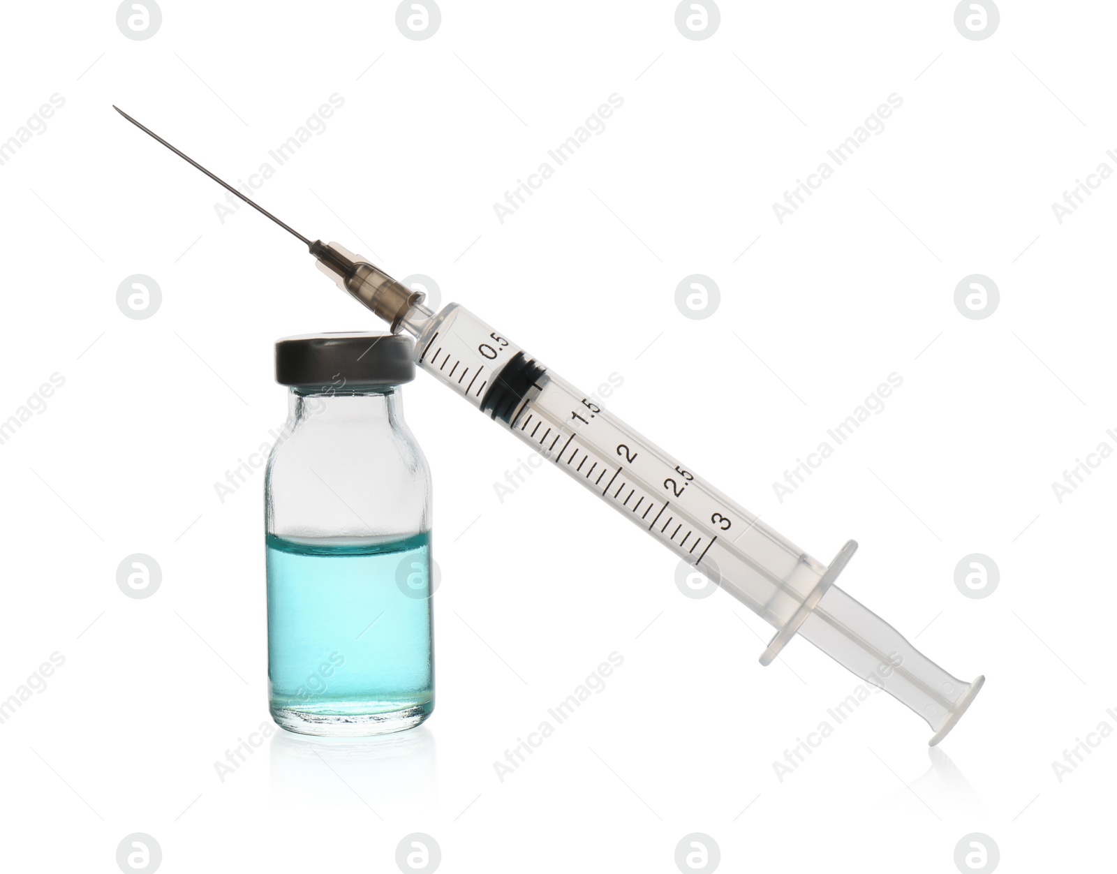 Photo of Syringe with vial of medicine isolated on white