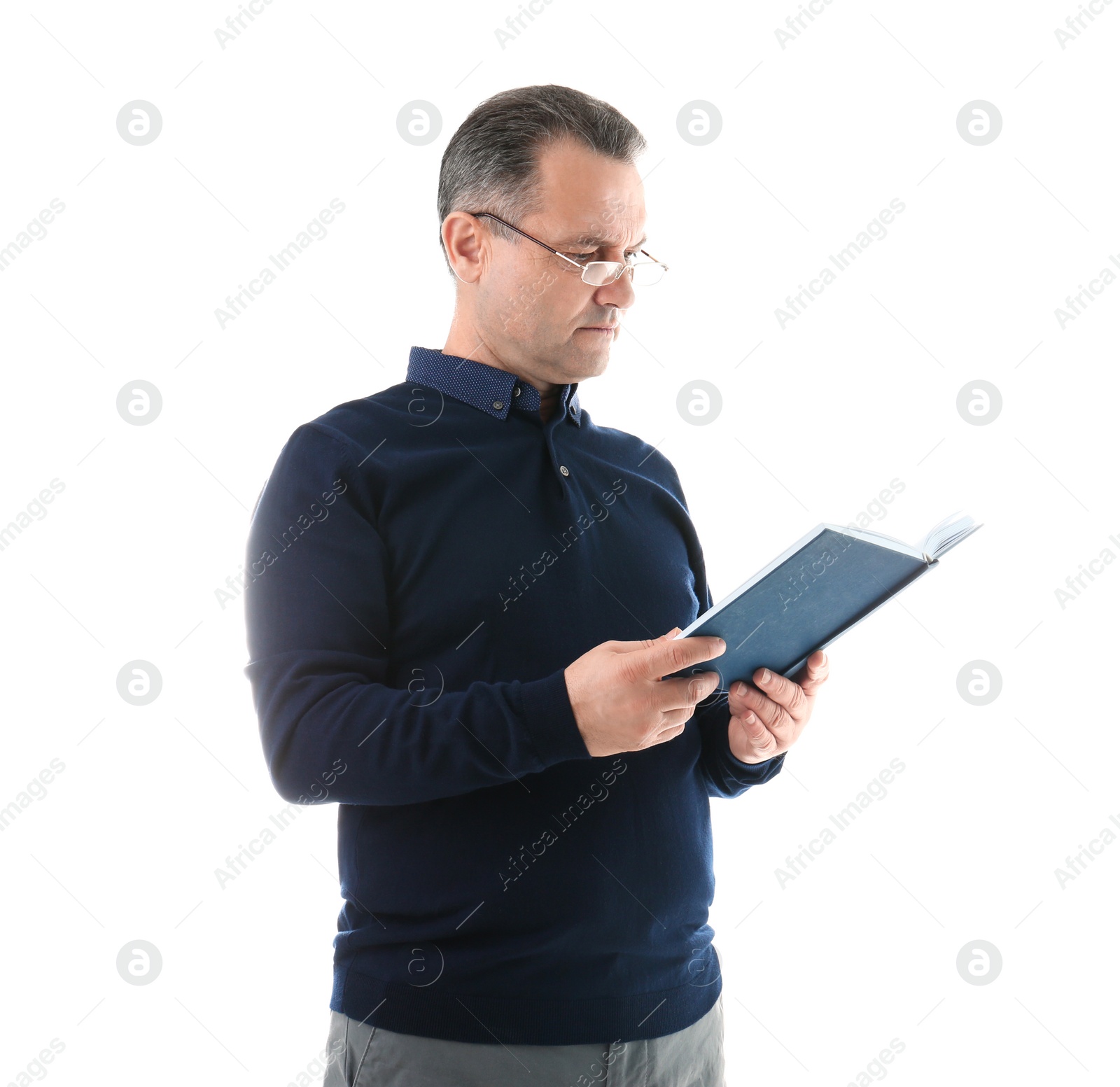 Photo of Portrait of male teacher with book on white background