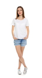 Photo of Young woman in t-shirt on white background. Mock up for design