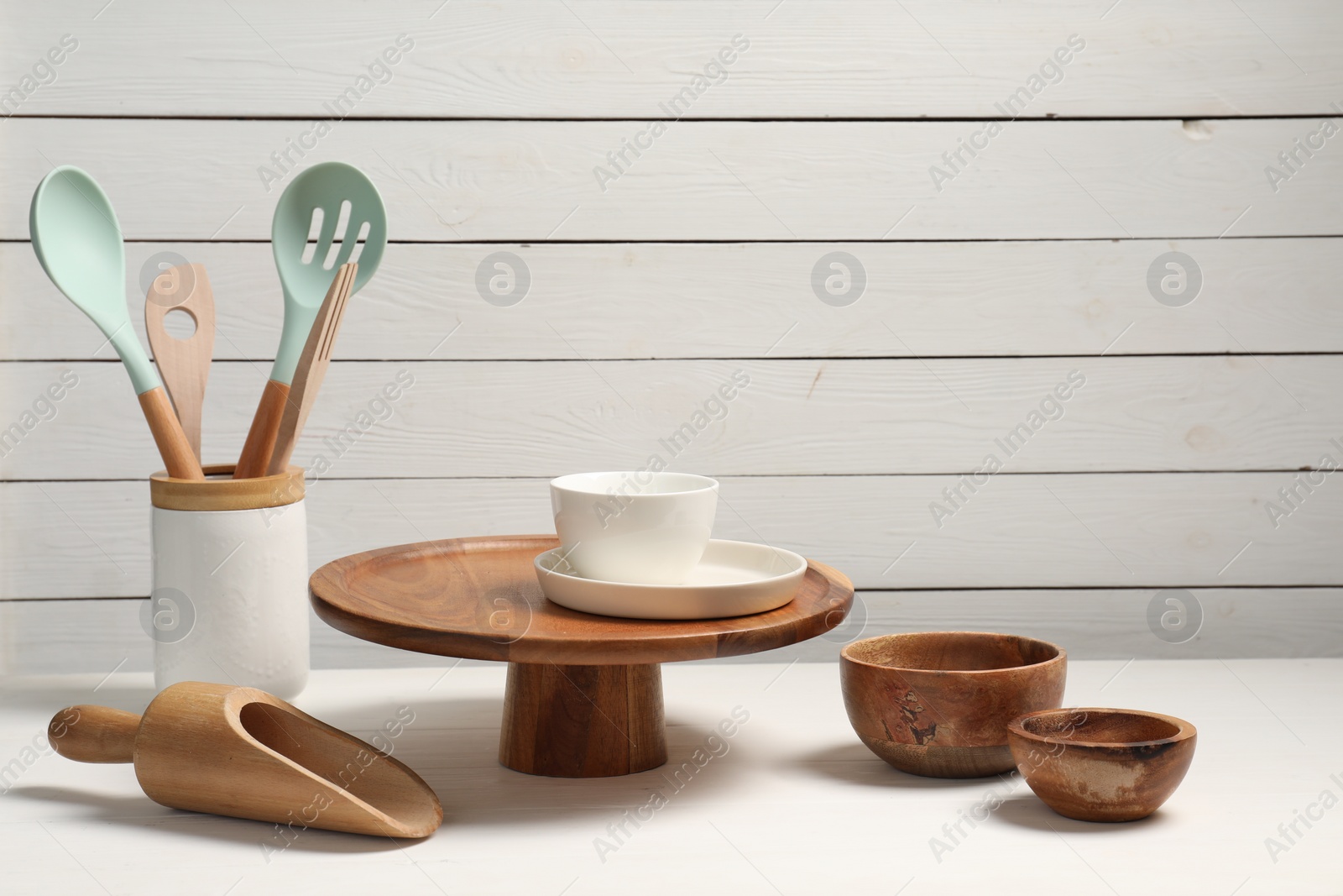 Photo of Set of different kitchen utensils on white table, space for text