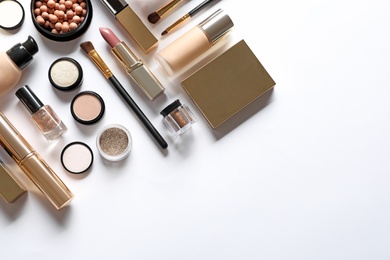 Photo of Set of luxury makeup products on white background, flat lay