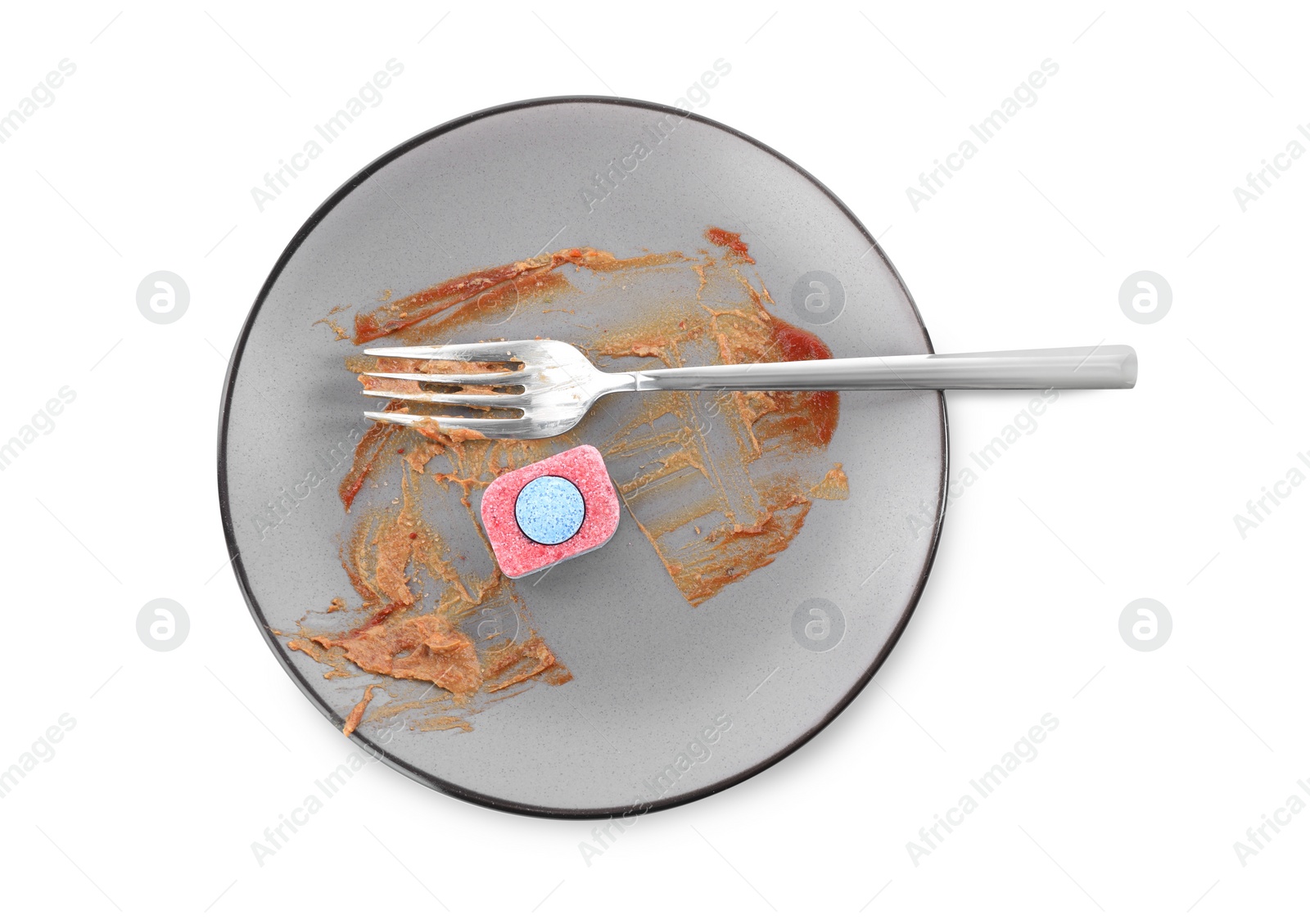 Photo of Dirty plate with dishwasher detergent tablet isolated on white, top view