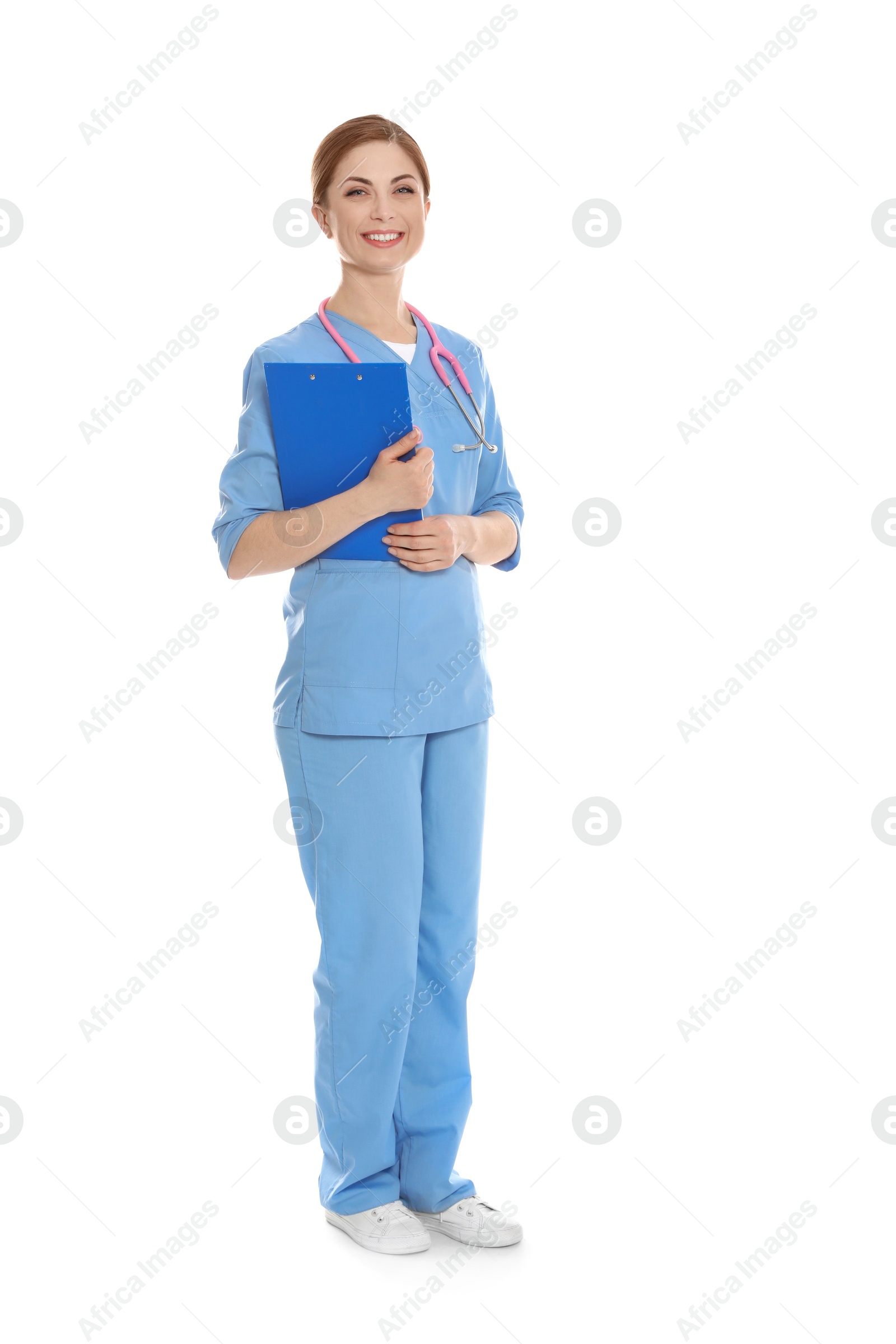 Photo of Full length portrait of medical doctor with clipboard and stethoscope isolated on white