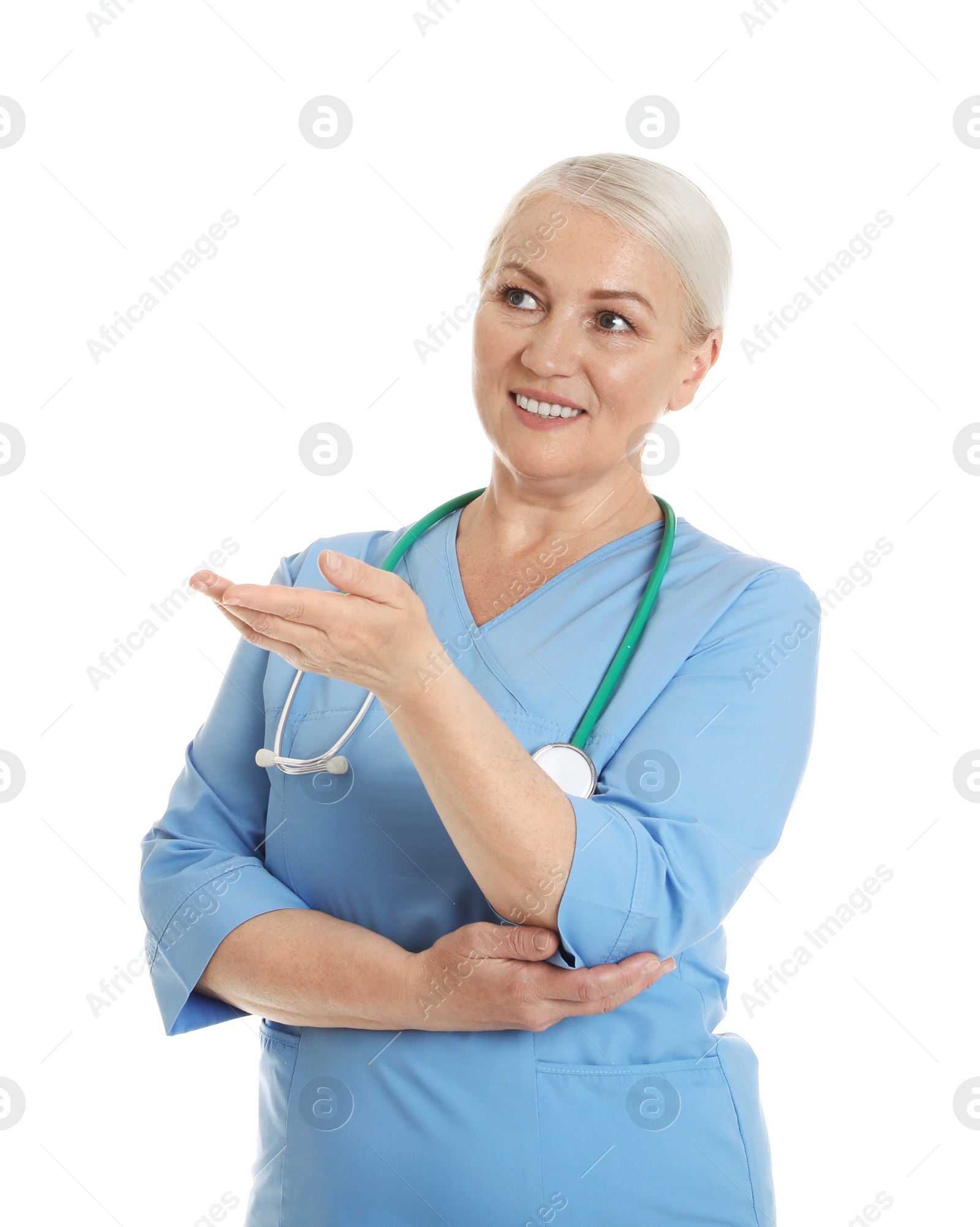 Photo of Portrait of female doctor in scrubs isolated on white. Medical staff