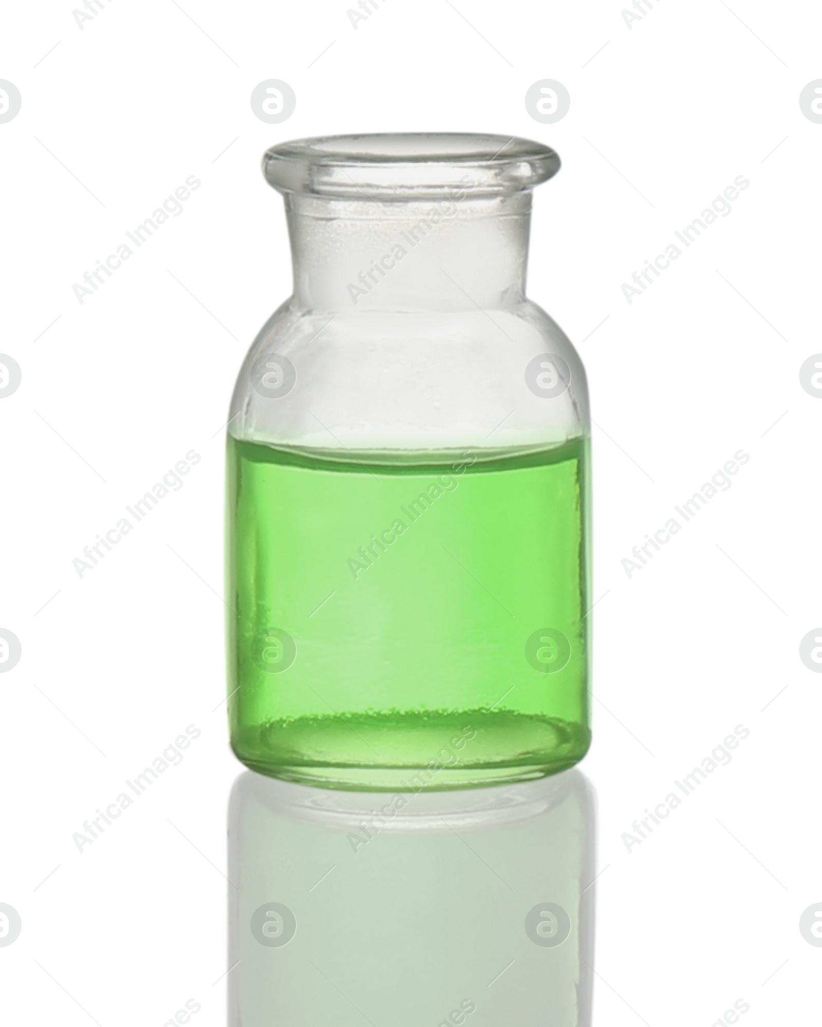 Photo of Apothecary bottle with light green liquid isolated on white