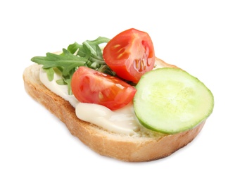 Photo of Slice of bread with spread and vegetables on white background