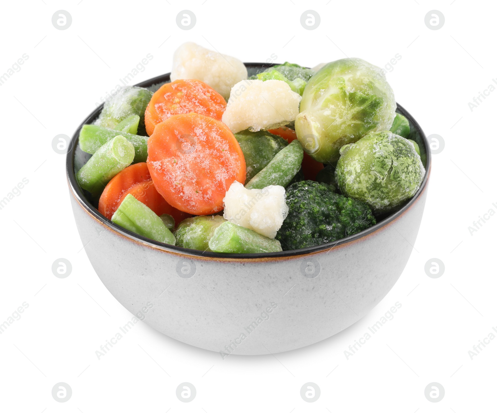 Photo of Mix of different frozen vegetables in bowl isolated on white