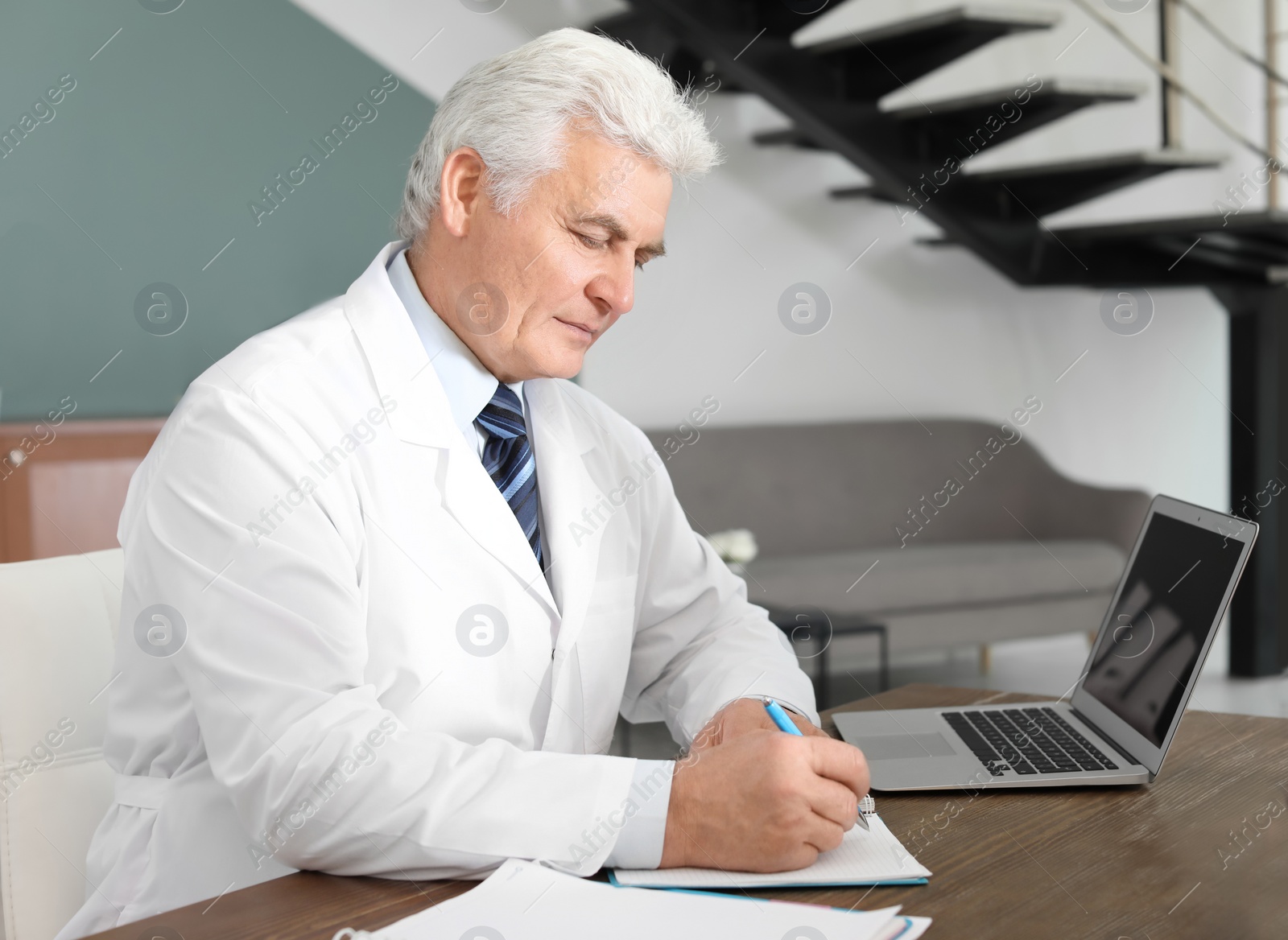 Photo of Child psychologist working with patient in office