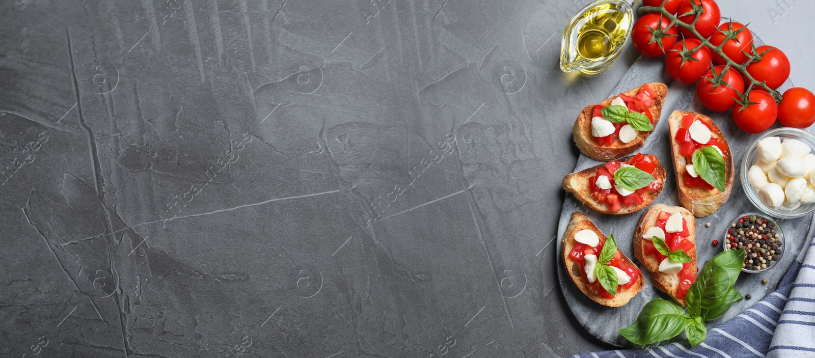 Image of Flat lay composition with delicious bruschettas on grey table, flat lay. Banner design 