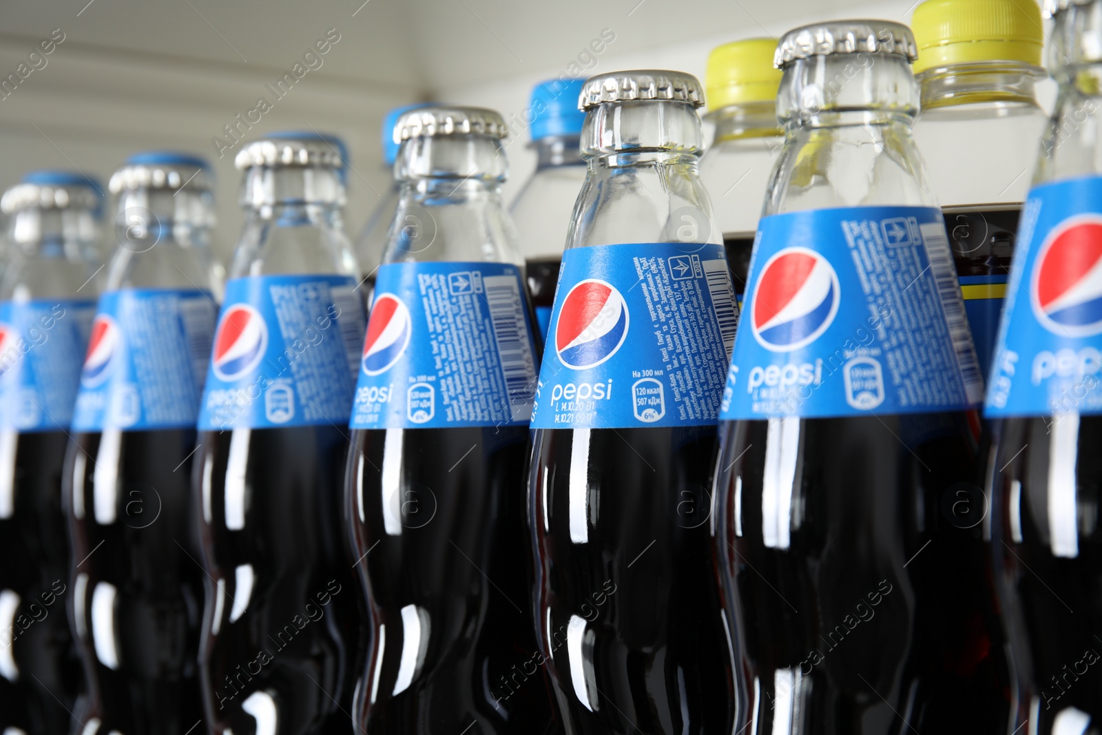 Photo of MYKOLAIV, UKRAINE - FEBRUARY 10, 2021: Bottles of Pepsi, closeup