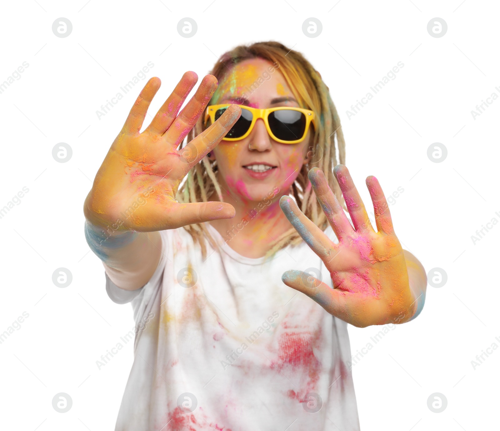 Photo of Woman covered with colorful powder dyes on white background. Holi festival celebration