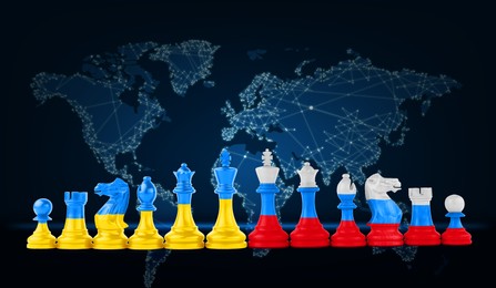 Image of Concept of war between Ukraine and Russia. Chess pieces in color of national flags against world map