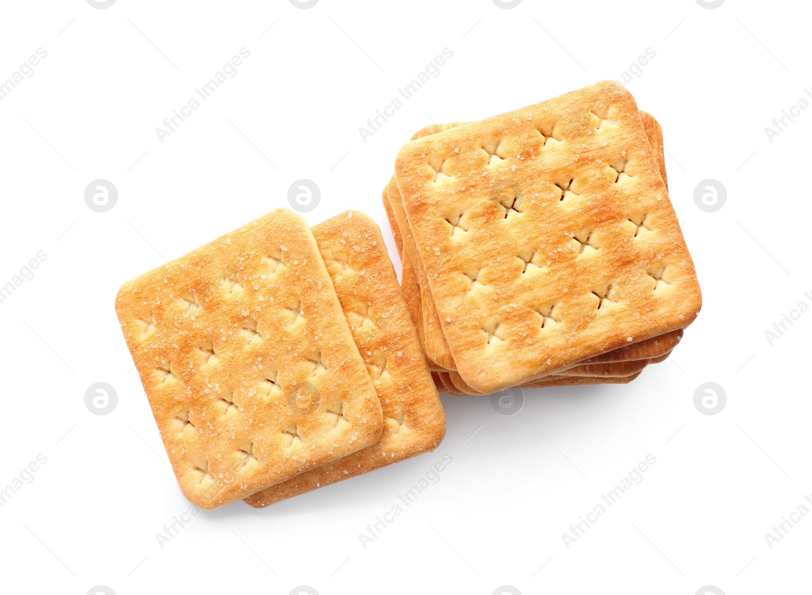 Photo of Delicious crispy crackers isolated on white, top view