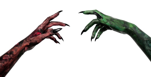 Scary monsters on white background, closeup of hands. Halloween characters