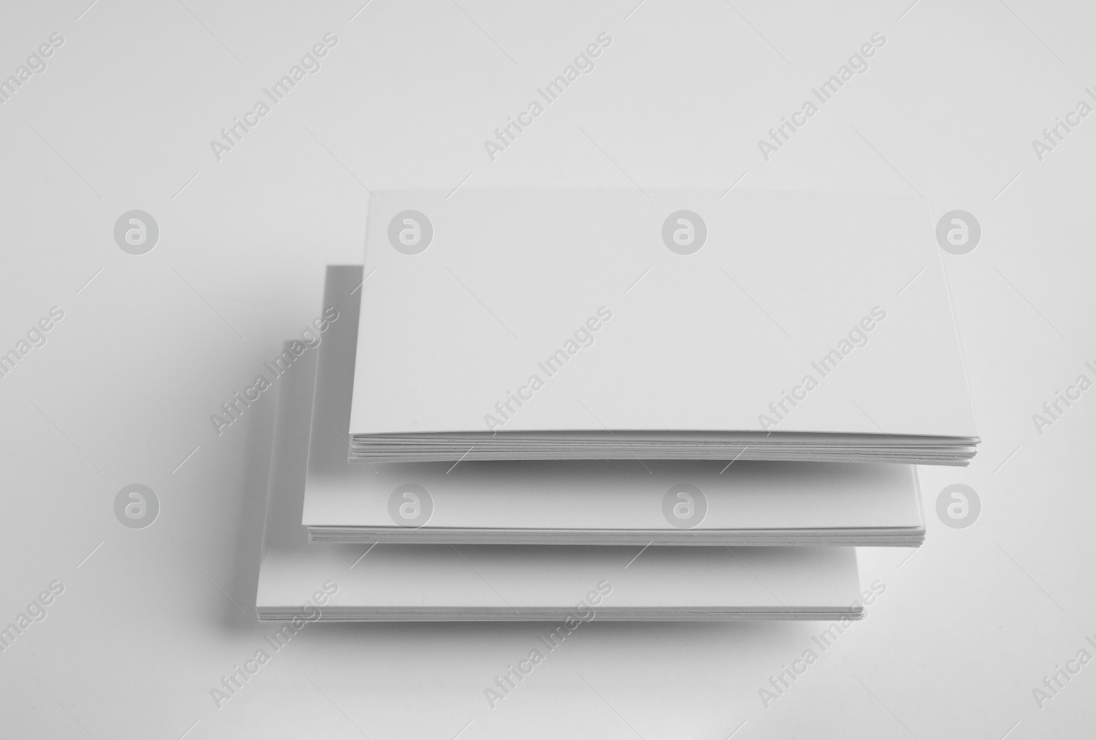 Photo of Blank business cards on white background. Mock up for design