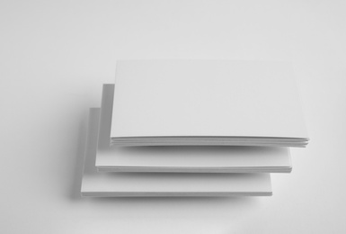 Photo of Blank business cards on white background. Mock up for design