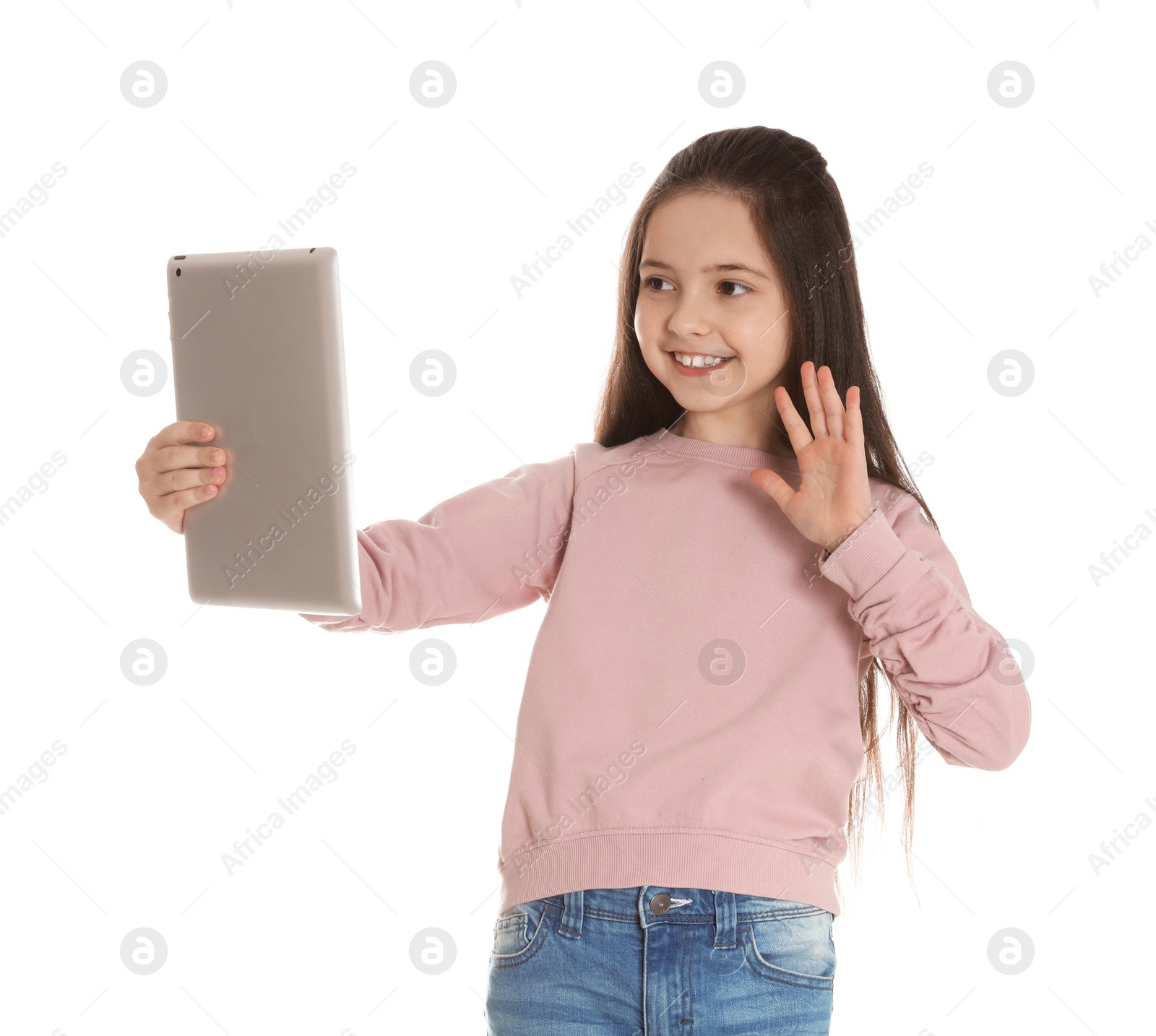 Photo of Little girl using video chat on tablet against white background