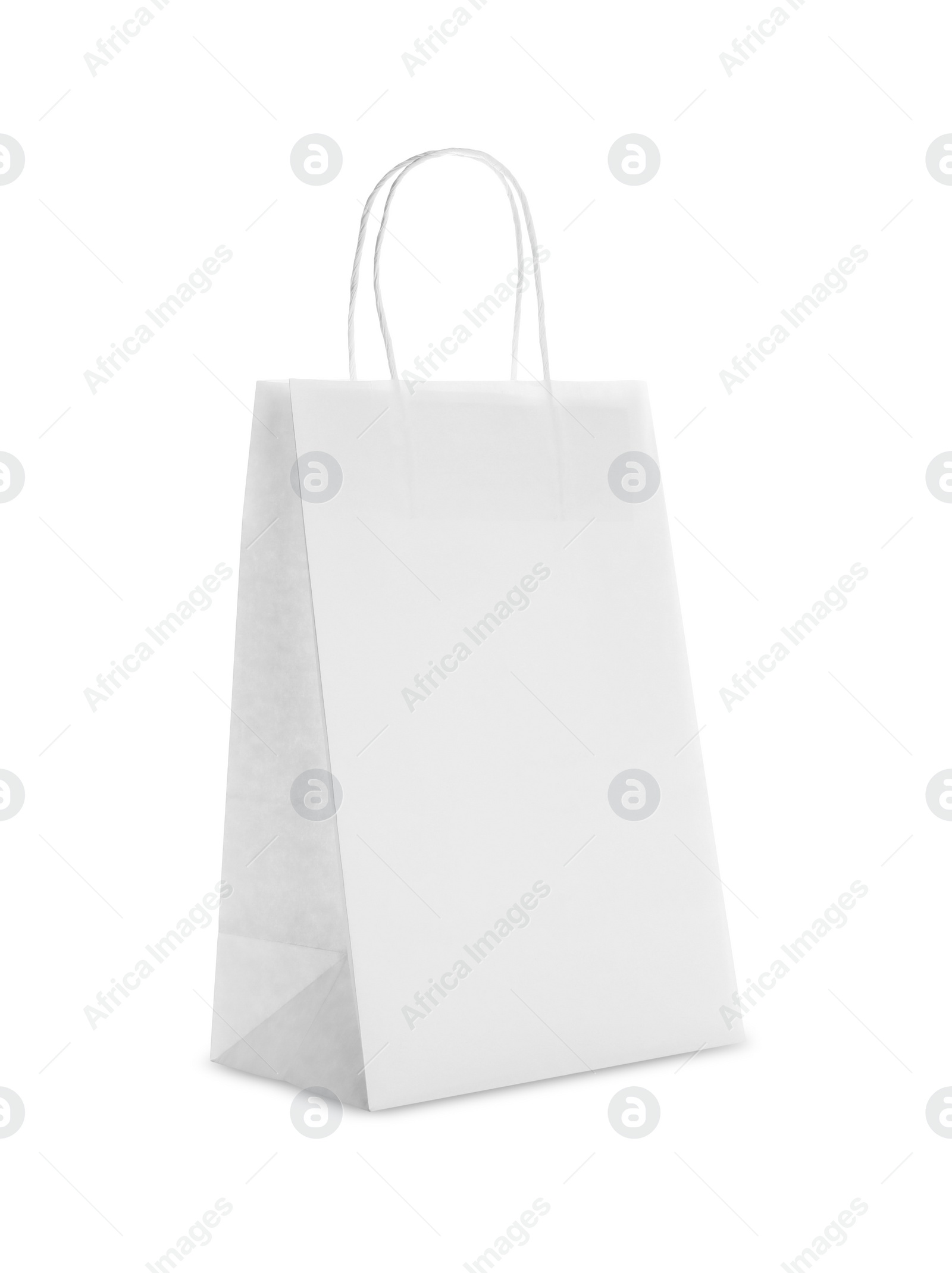 Photo of Blank paper bag on white background. Space for design