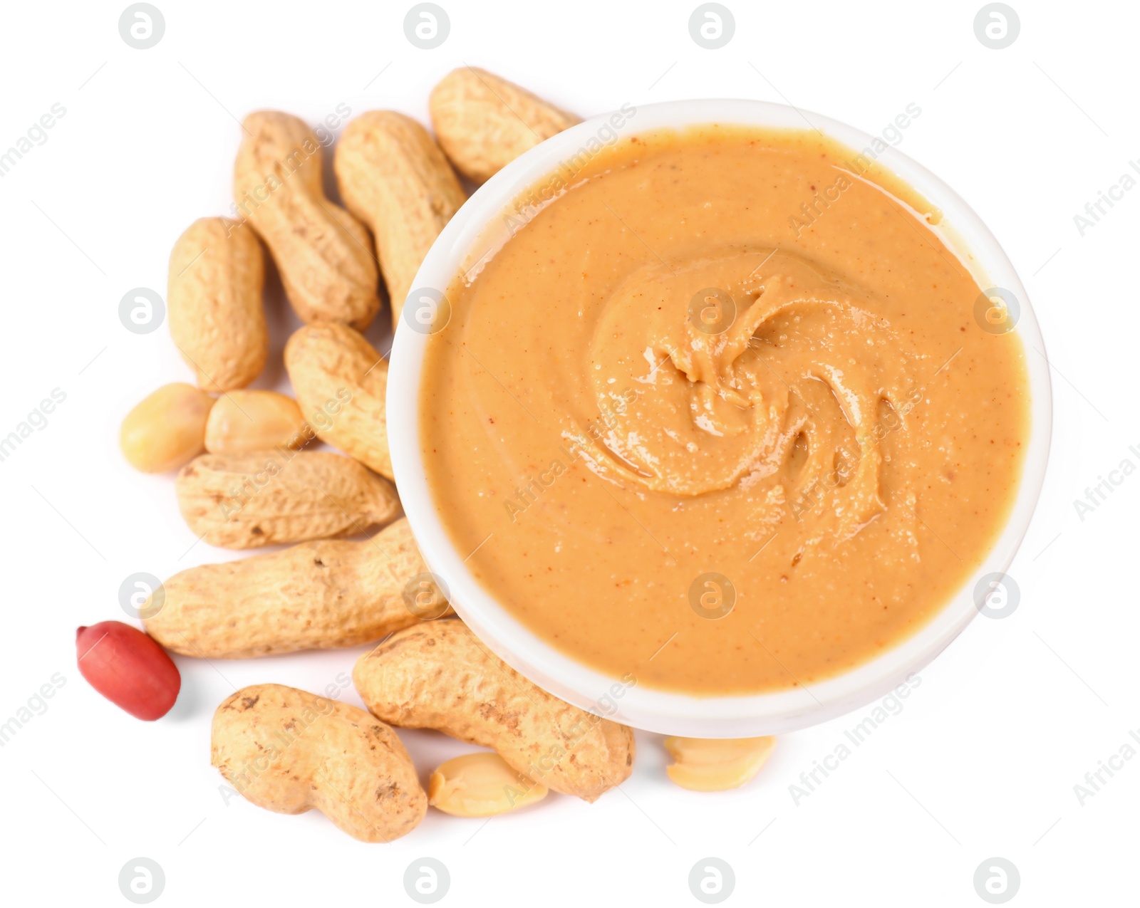 Photo of Delicious nut butter and peanuts isolated on white, top view