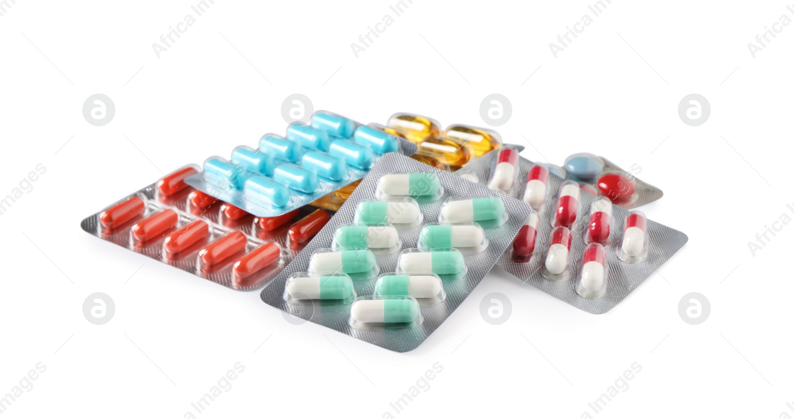 Photo of Blisters with different pills on white background