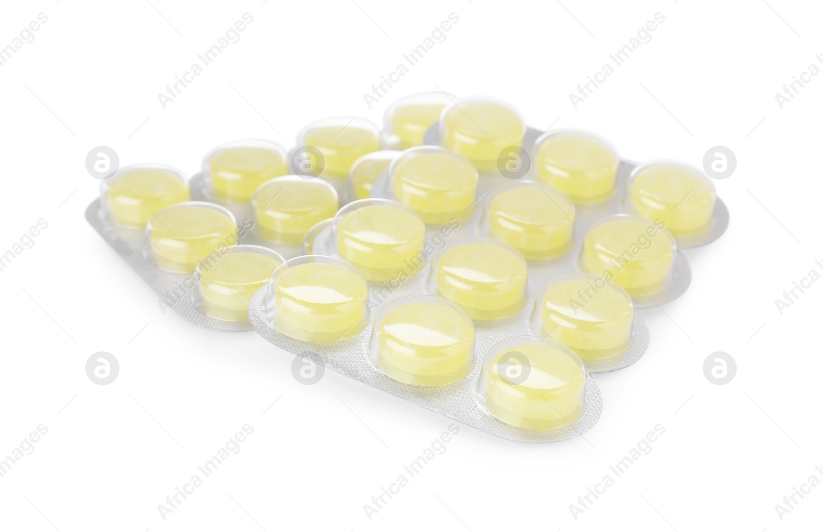 Photo of Blisters with yellow cough drops isolated on white. Cold remedies