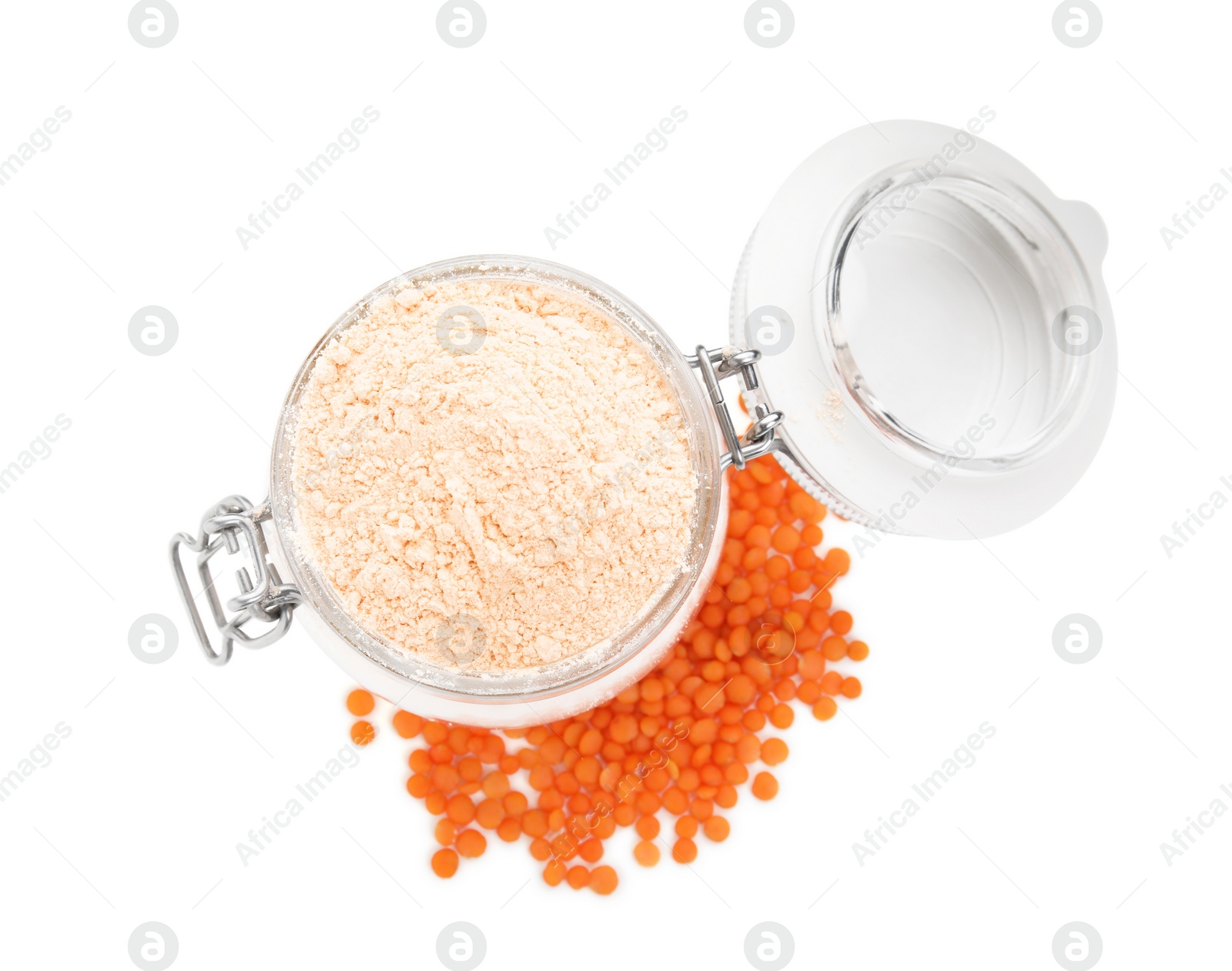 Photo of Glass jar of lentil flour and seeds isolated on white, top view