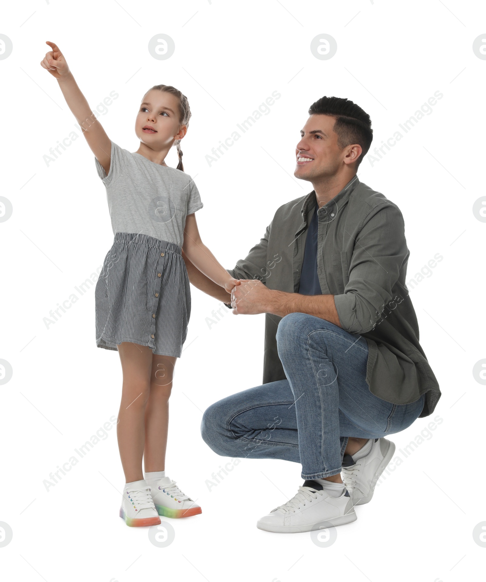 Photo of Little girl with her father on white background