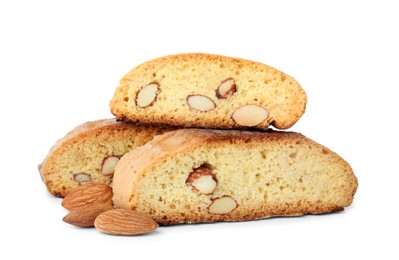 Slices of tasty cantucci and nuts on white background. Traditional Italian almond biscuits