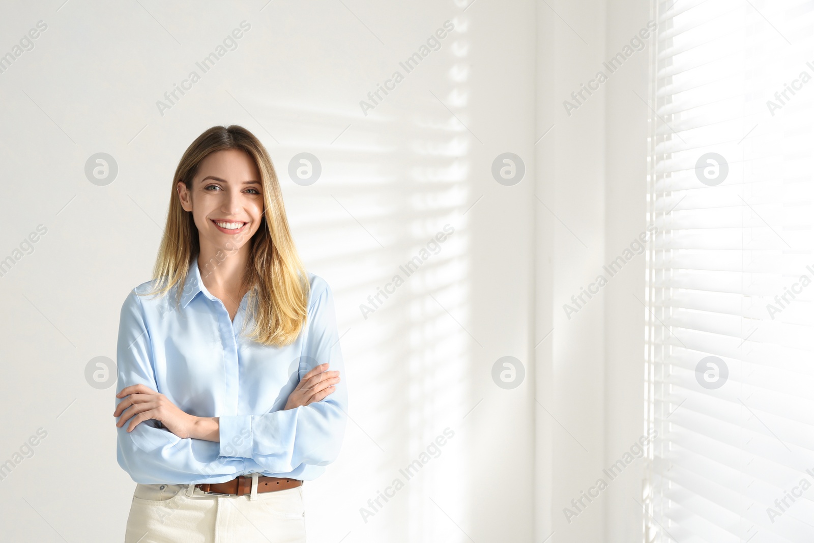 Photo of Portrait of beautiful young businesswoman in office